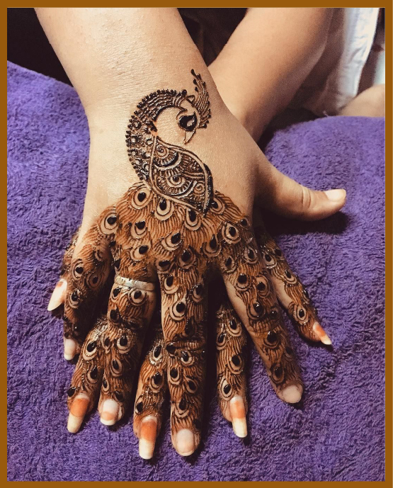 Artistic Back Hand Mehndi With Peacock Motif